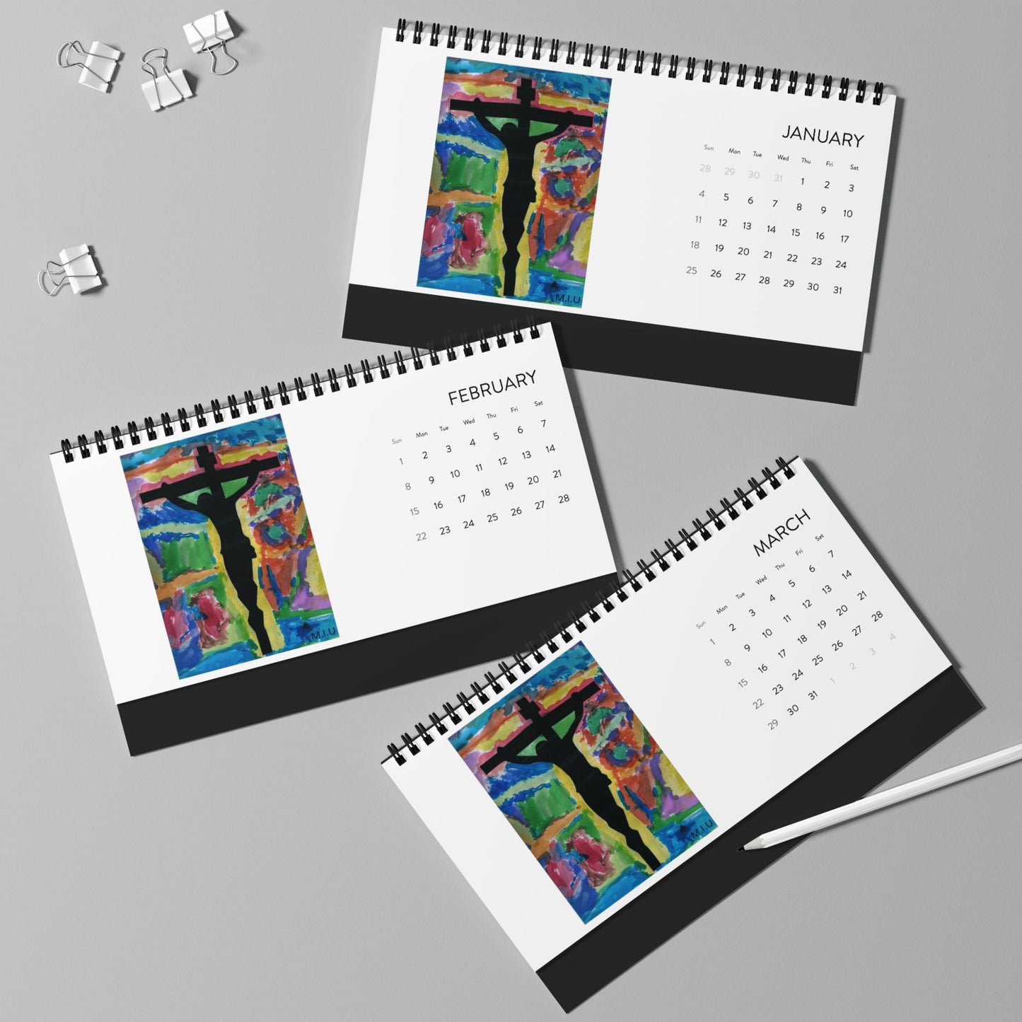 M.I.U 2026 Faith Calendar — Crucifix Watercolor Art by Matías